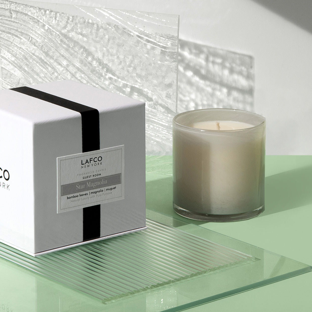 Lifestyle image of Lafco Star Magnolia Candle variant: 15.5 oz (Signature)