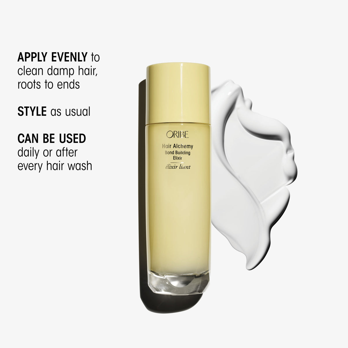 A bottle of Oribe Hair Alchemy Bond Repair Leave-In Treatment next to a smear of white cream, with instructions to apply evenly to clean damp hair, style as usual, and use daily or after every wash.