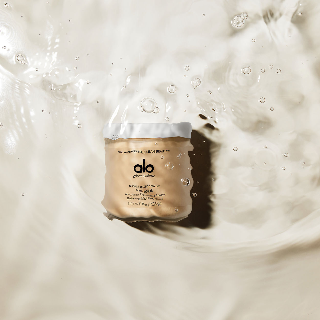 Lifestyle image of Alo Renew and Glow Body Polish