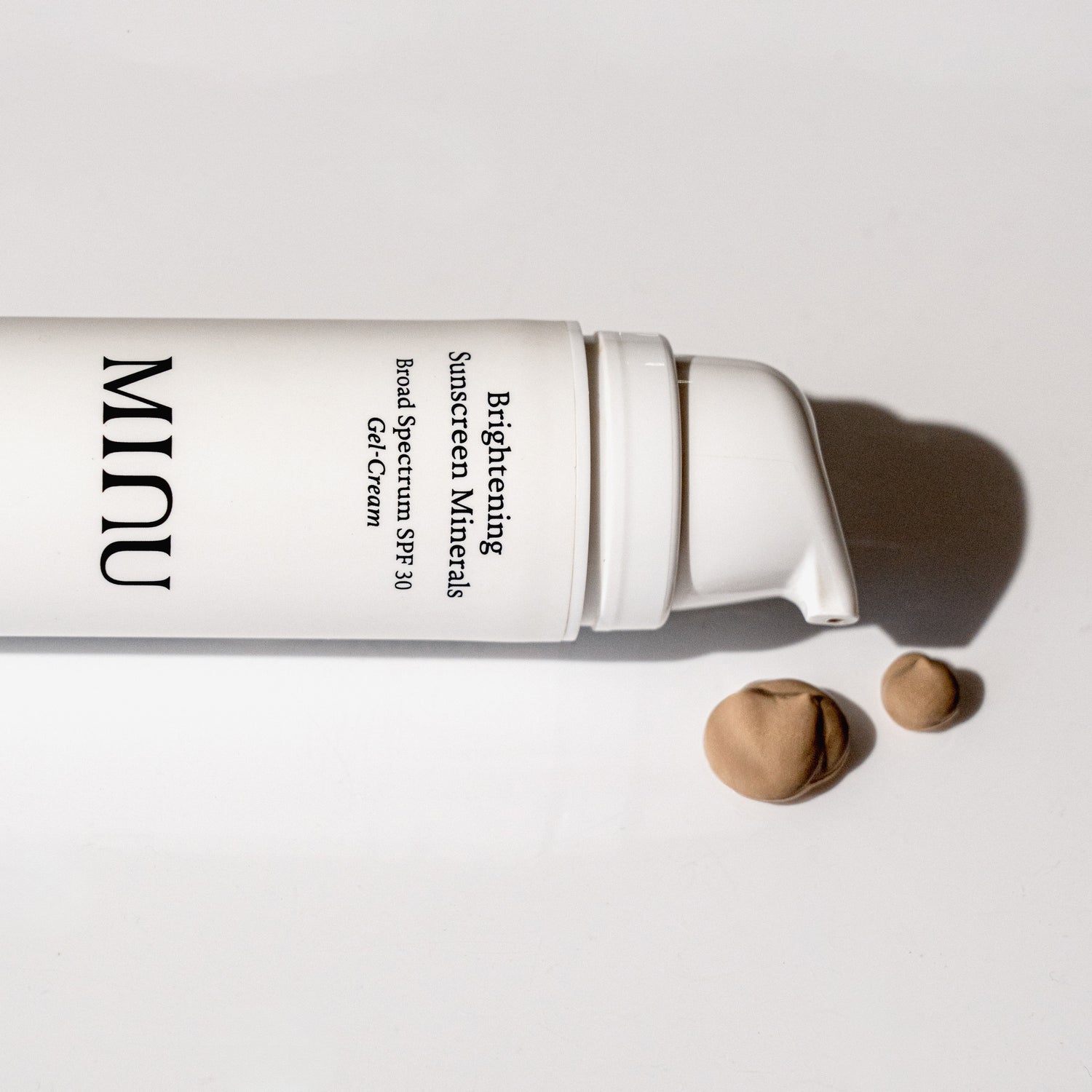 Image of a closed Minu Brightening Sunscreen Minerals Broad Spectrum SPF 30 Gel-Cream