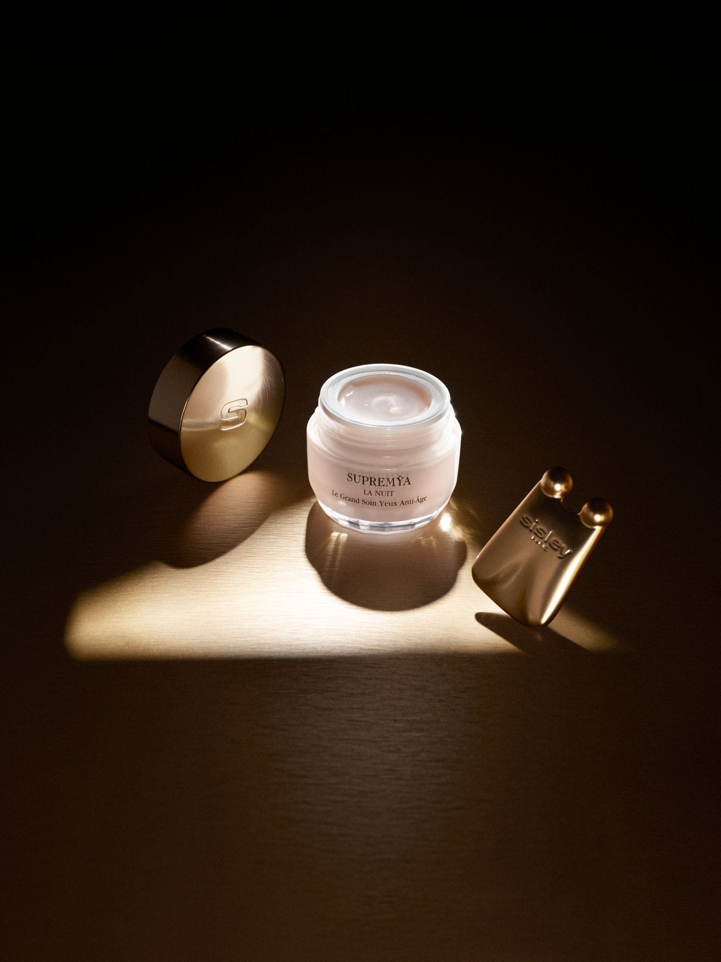 Lifestyle image of Sisley Paris Supremÿa at Night The Supreme Anti-Aging Eye Cream