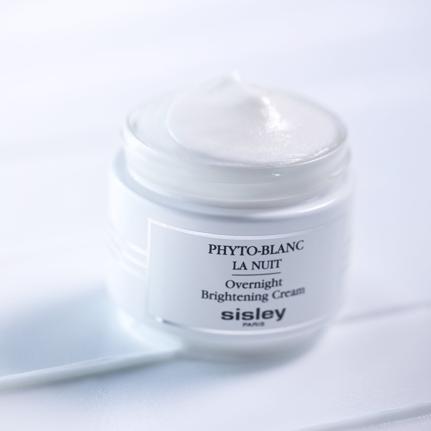Image of an open Sisley Paris Phyto-Blanc Overnight Brightening Cream