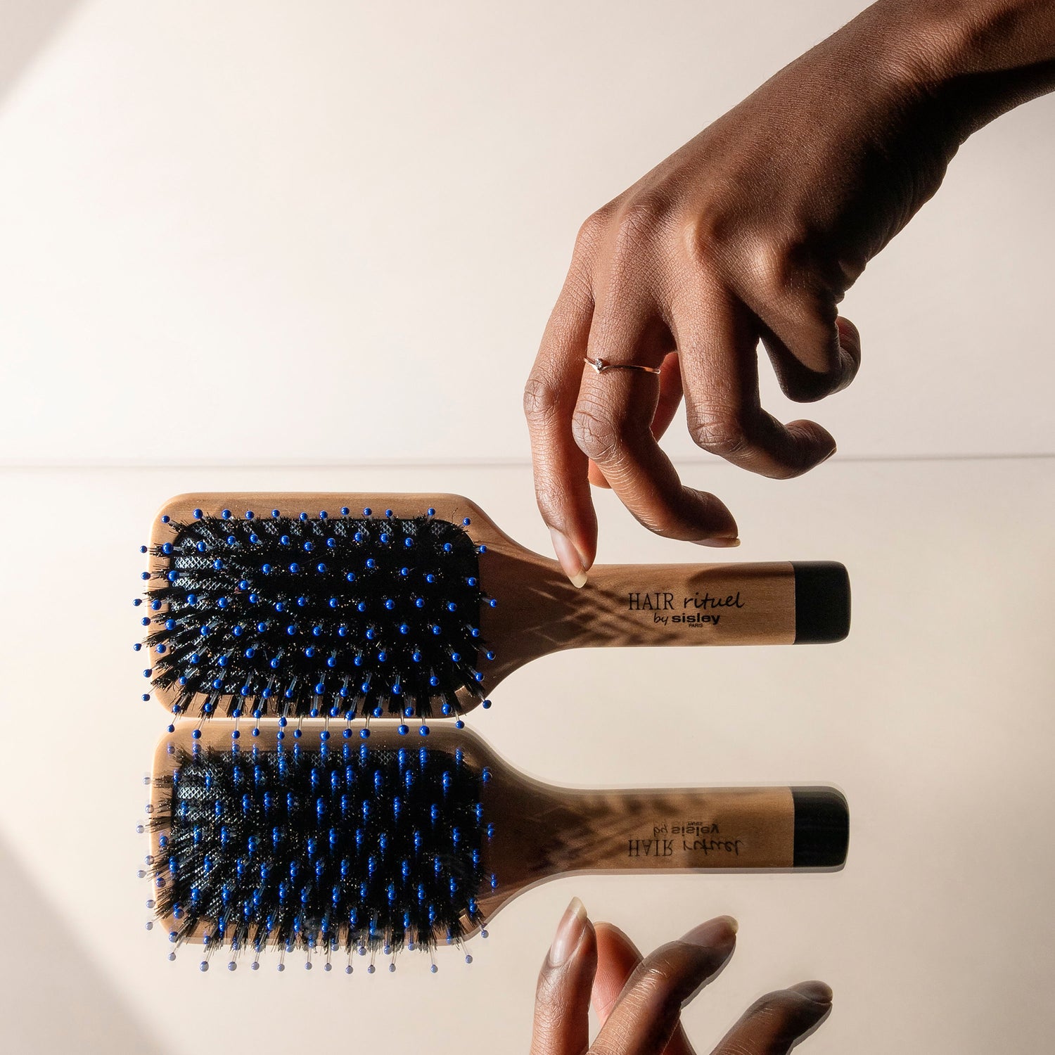 Lifestyle image of Sisley Paris The Pocket Brush Radiance and Softness