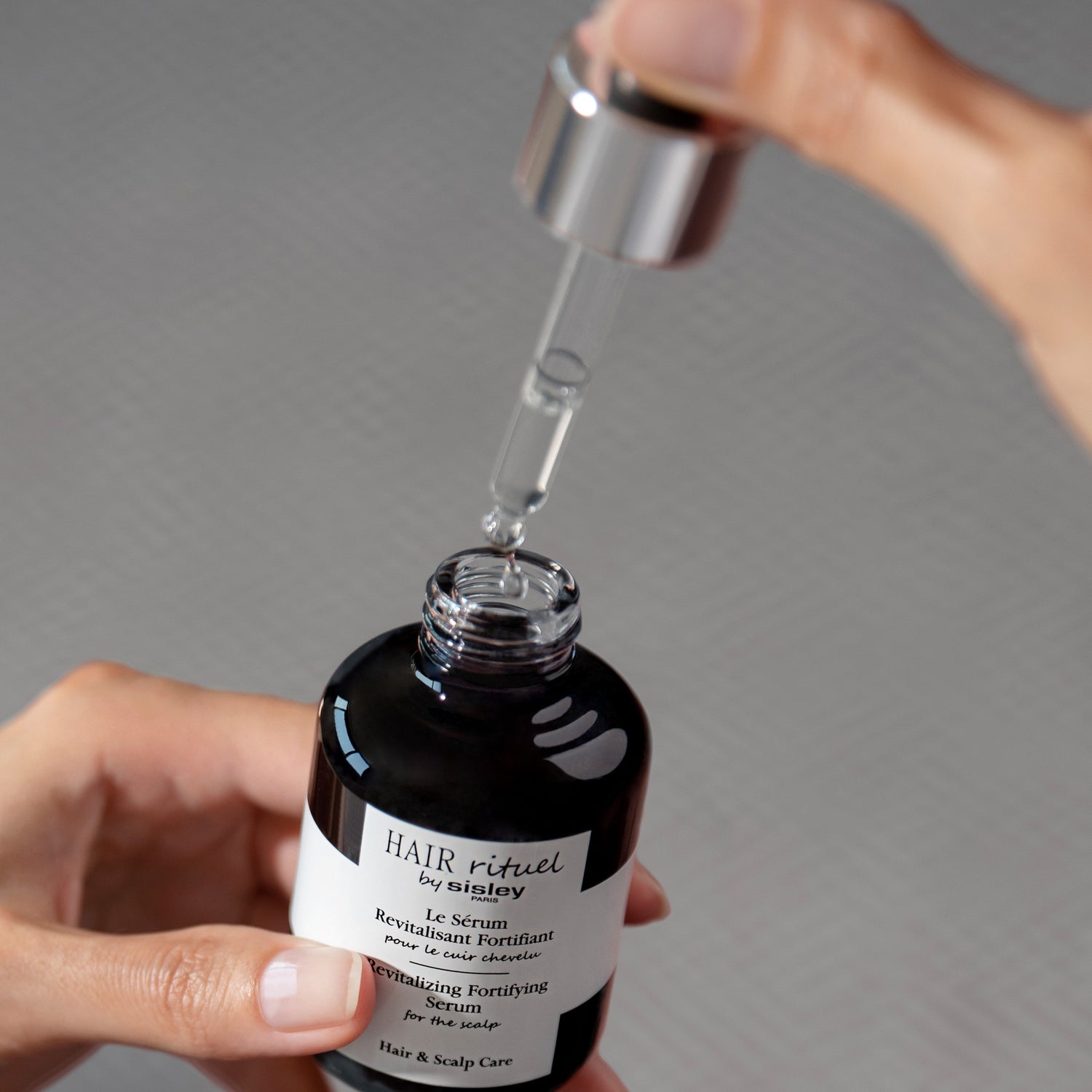 Model image of Sisley Paris Revitalizing Fortifying Serum for the Scalp