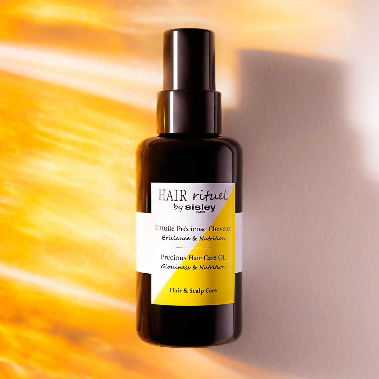 Lifestyle image of Sisley Paris Precious Hair Care Oil Glossiness and Nutrition