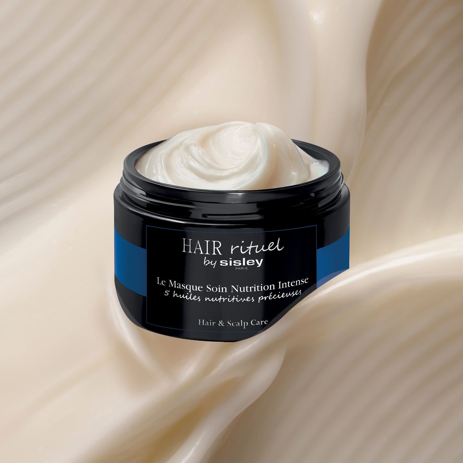 Image of an open Sisley Paris The Intense Nutrition Hair Care Mask