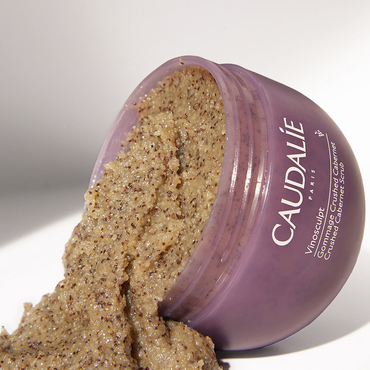 Image of an open Caudalie Vinosculpt Crushed Cabernet Scrub