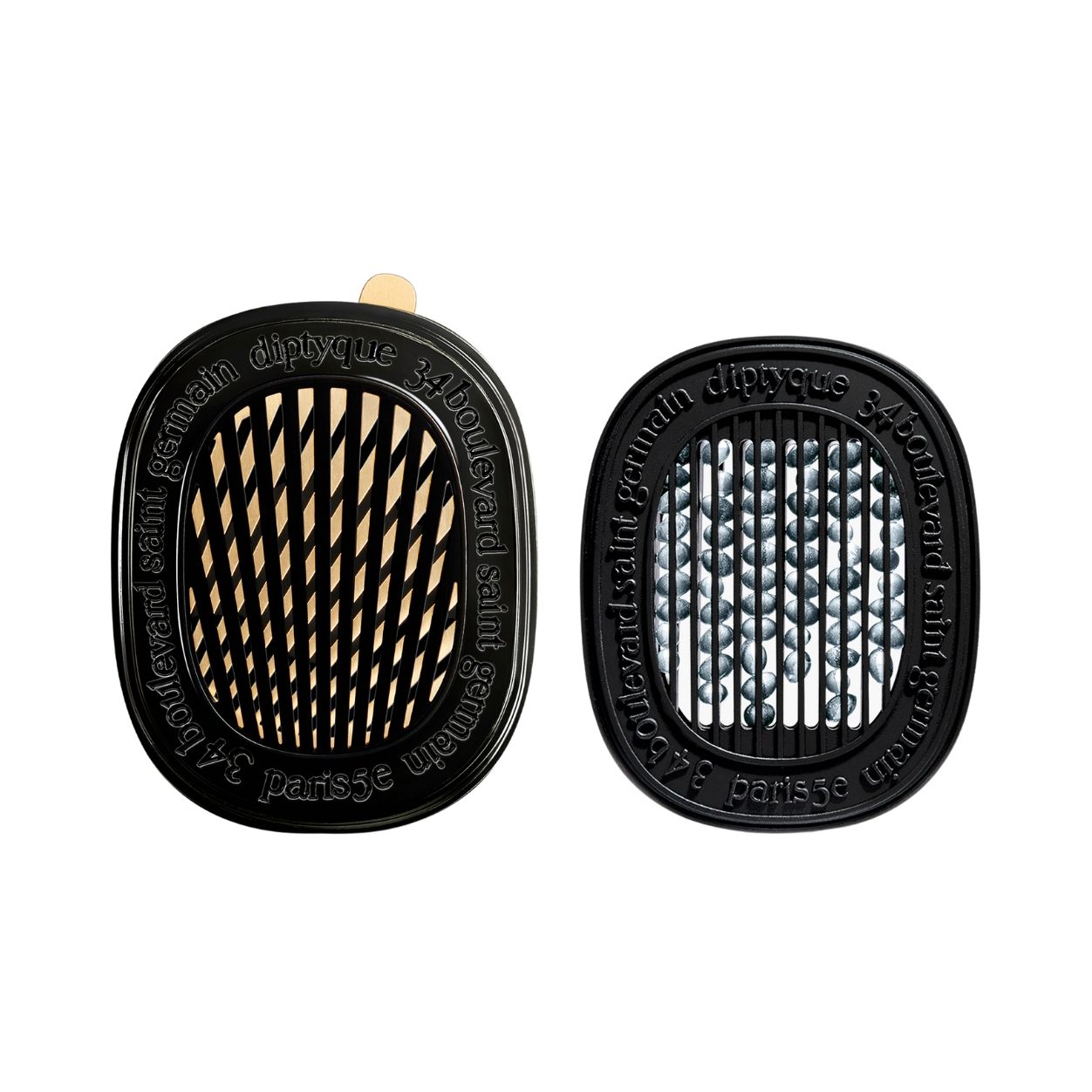 Image of an open Diptyque Figuier (Fig Tree) Car Diffuser and Insert