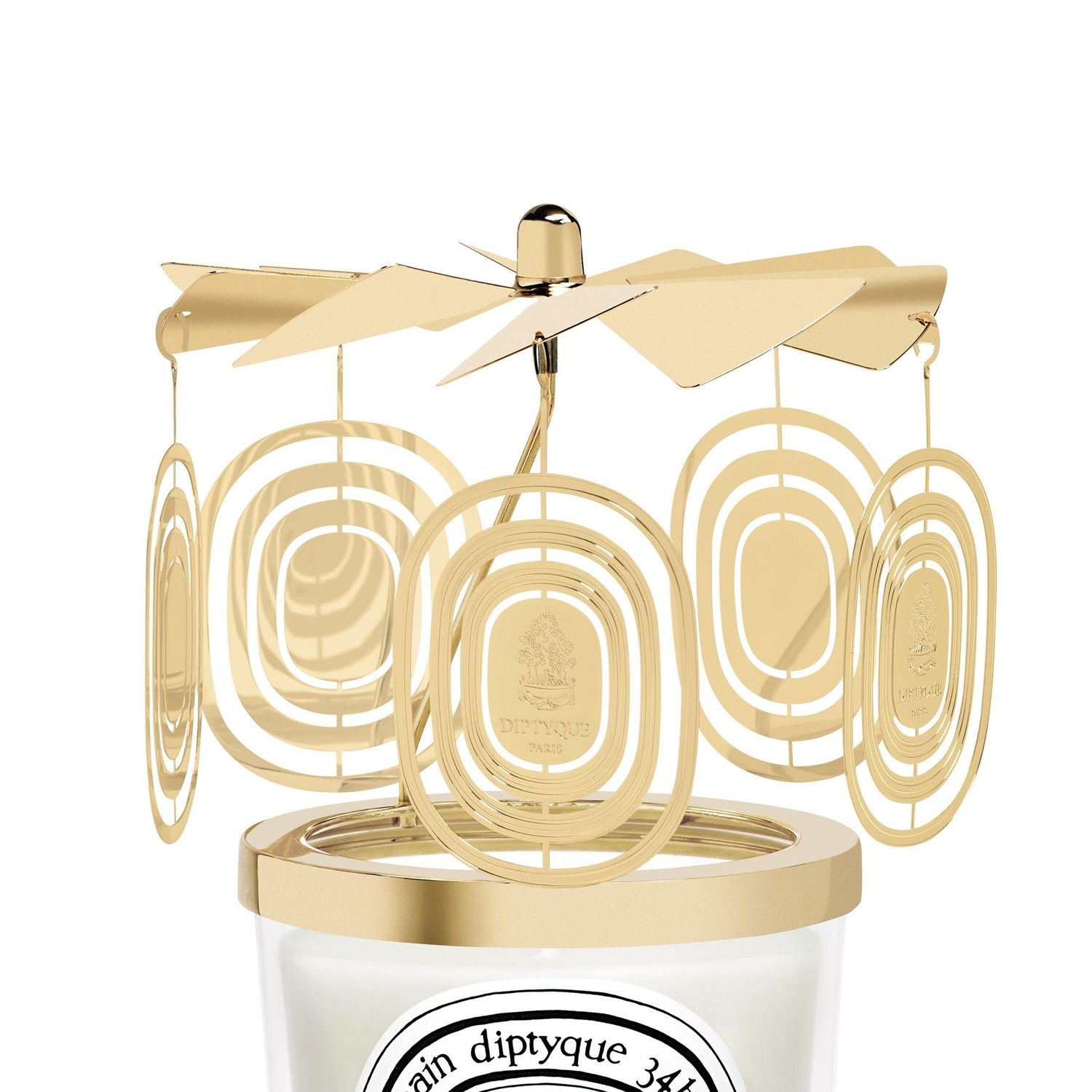 Image of an open Diptyque Holiday Carousel For Classic Candle (Limited Edition)