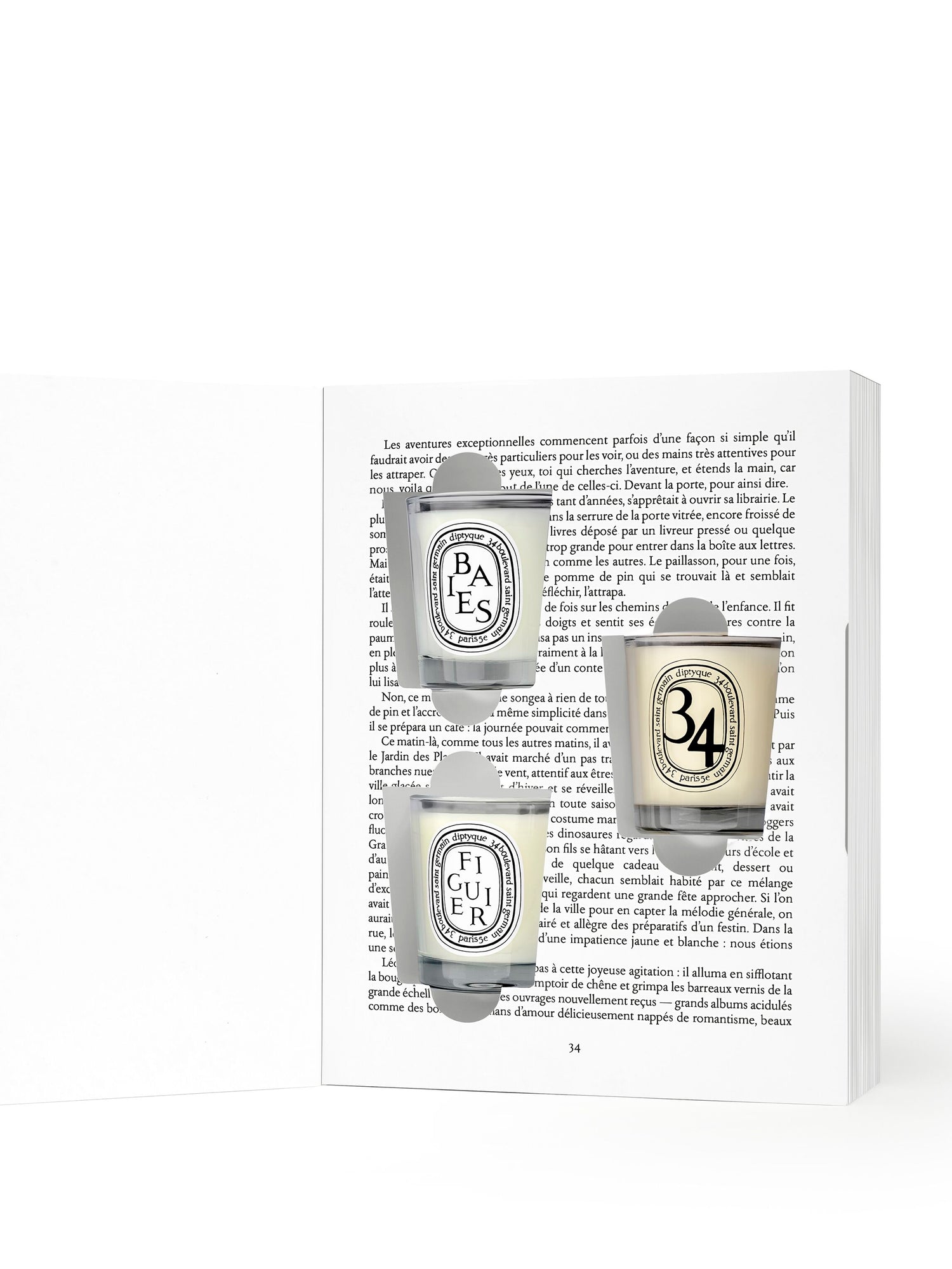 Image of an open Diptyque Holiday Surprise Set with 3 Miniature Candles (Limited Edition)