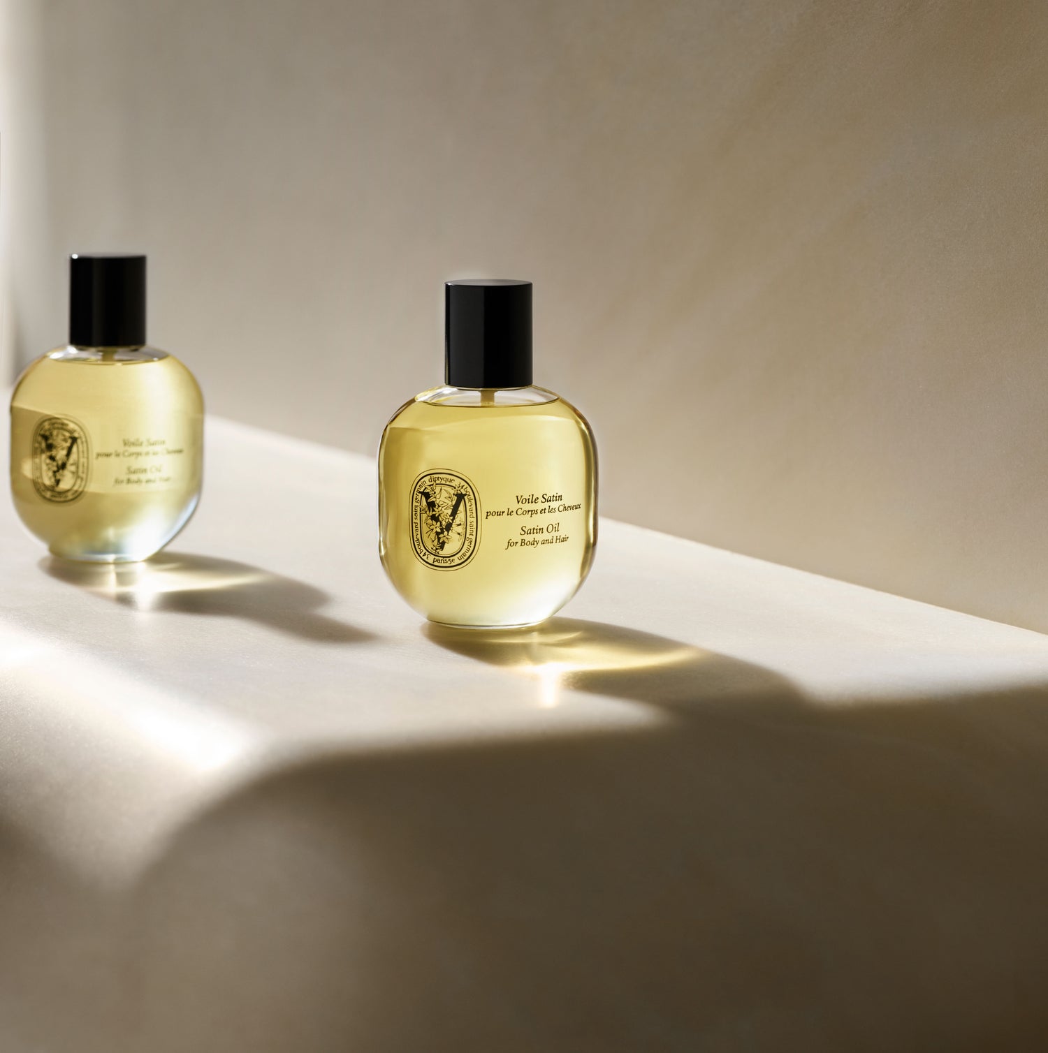 Lifestyle image of Diptyque Satin Oil for Body and Hair