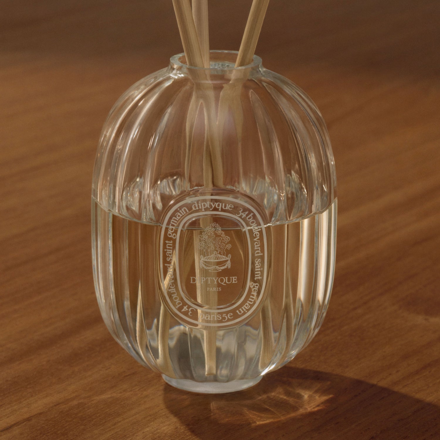 Lifestyle image of Diptyque Home Fragrance Diffuser Glass Vessel