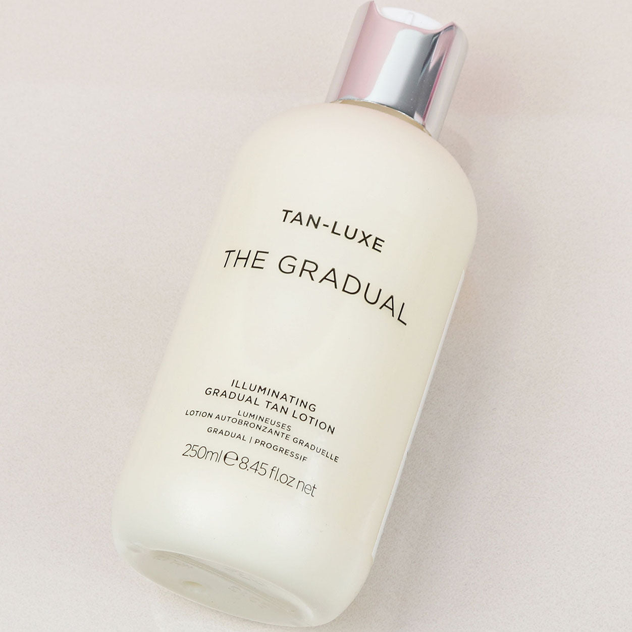 Lifestyle image of Tan-Luxe The Gradual Illuminating Tanning Lotion
