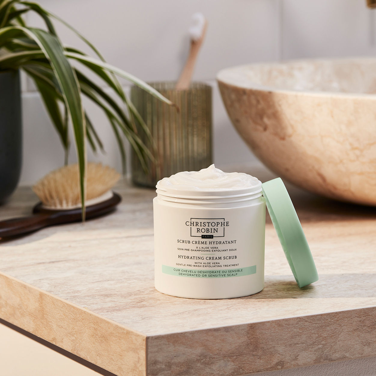Lifestyle image of Christophe Robin Hydrating Cream Scrub wtih Aloe Vera