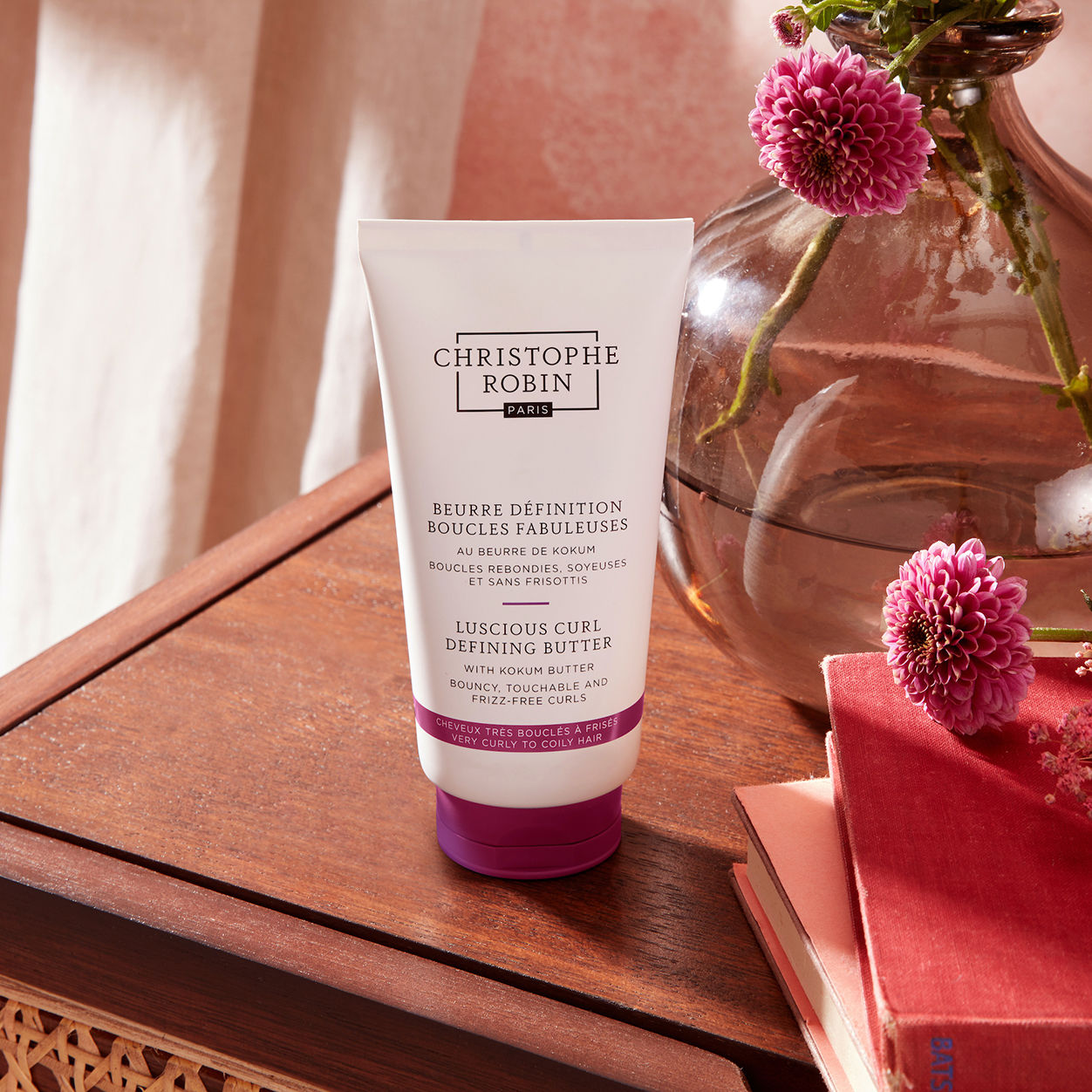 Lifestyle image of Christophe Robin Luscious Curl Defining Butter with Kokum Butter
