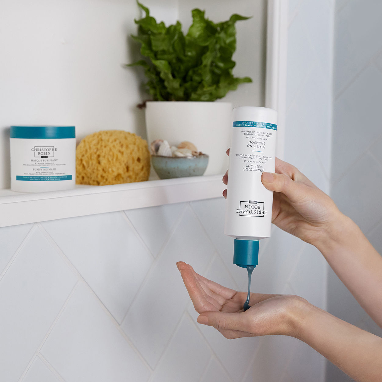 Lifestyle image of Christophe Robin Purifying Shampoo with Thermal Mud