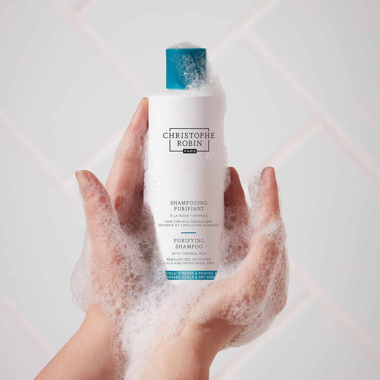 Model image of Christophe Robin Purifying Shampoo with Thermal Mud