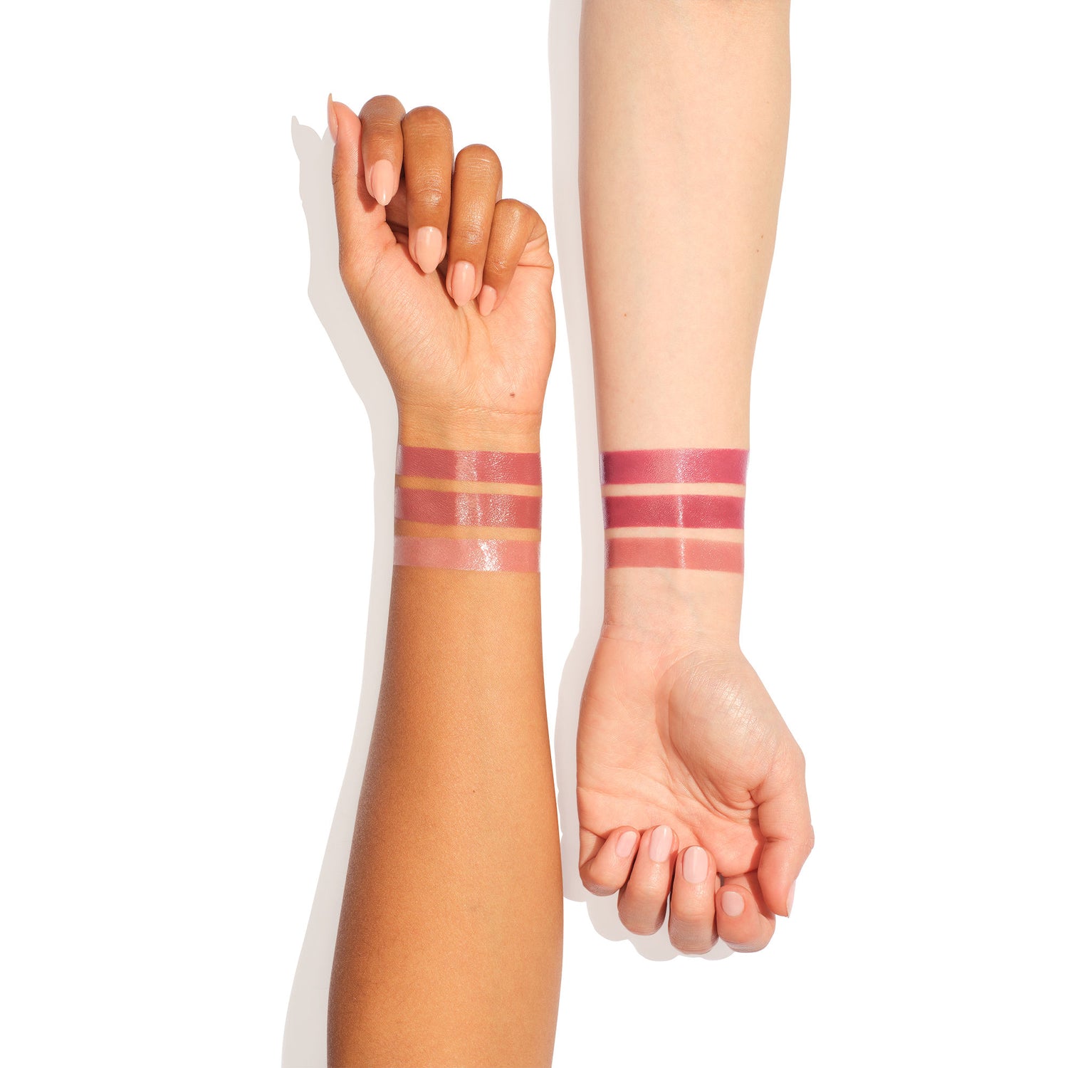An arm swatch of Charlotte Tilbury Hollywood Iconic Mini Lip Trio (Limited Edition)