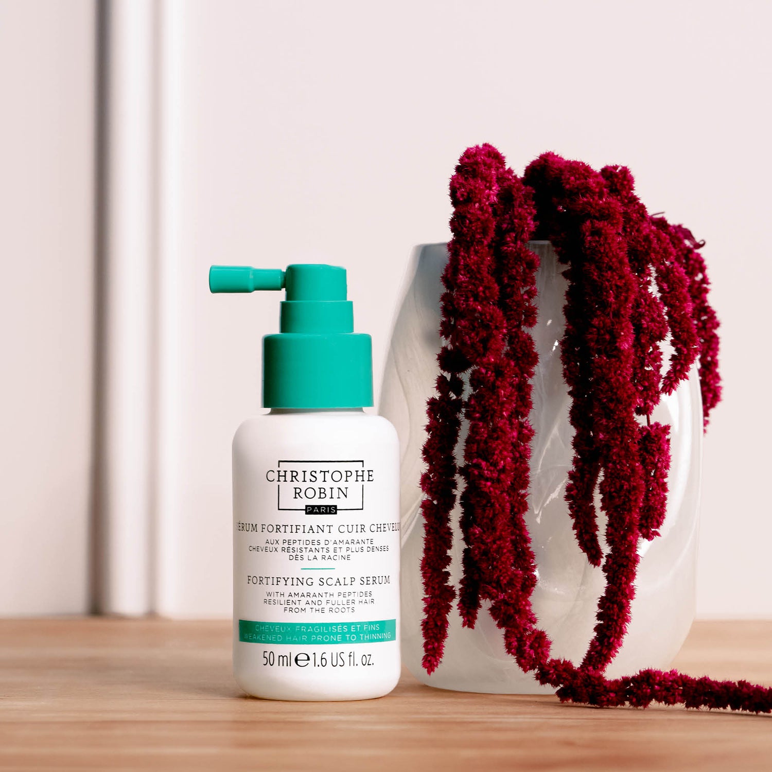 Lifestyle image of Christophe Robin Fortifying Scalp Serum with Amaranth Peptides