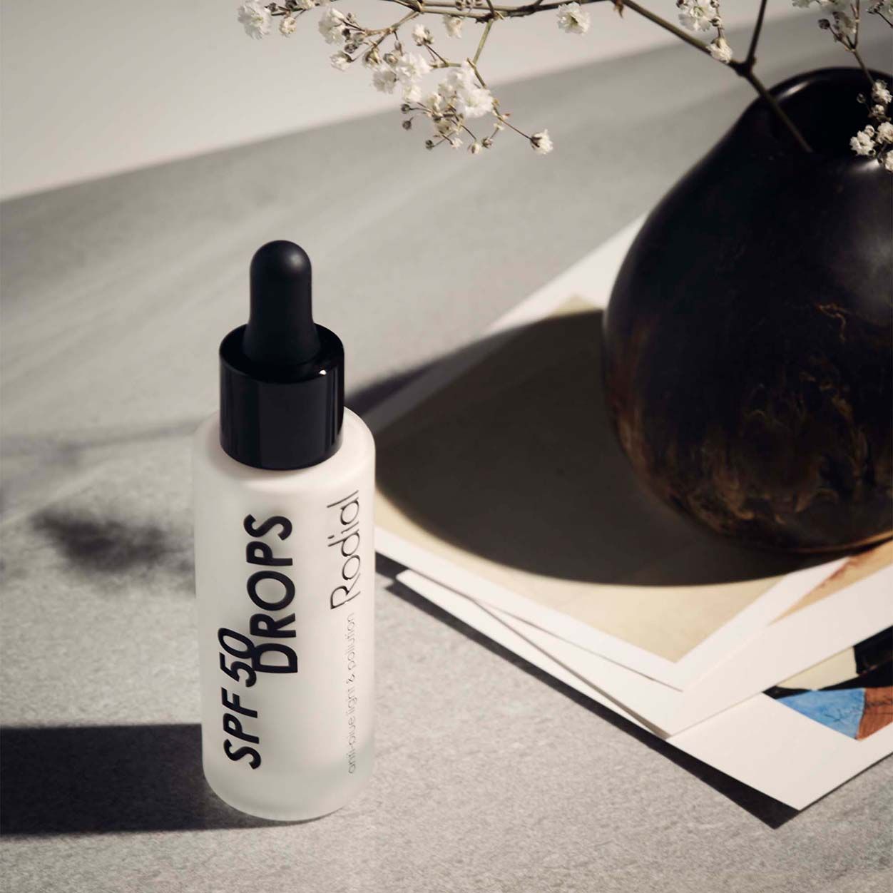 Lifestyle image of Rodial SPF 50 Drops