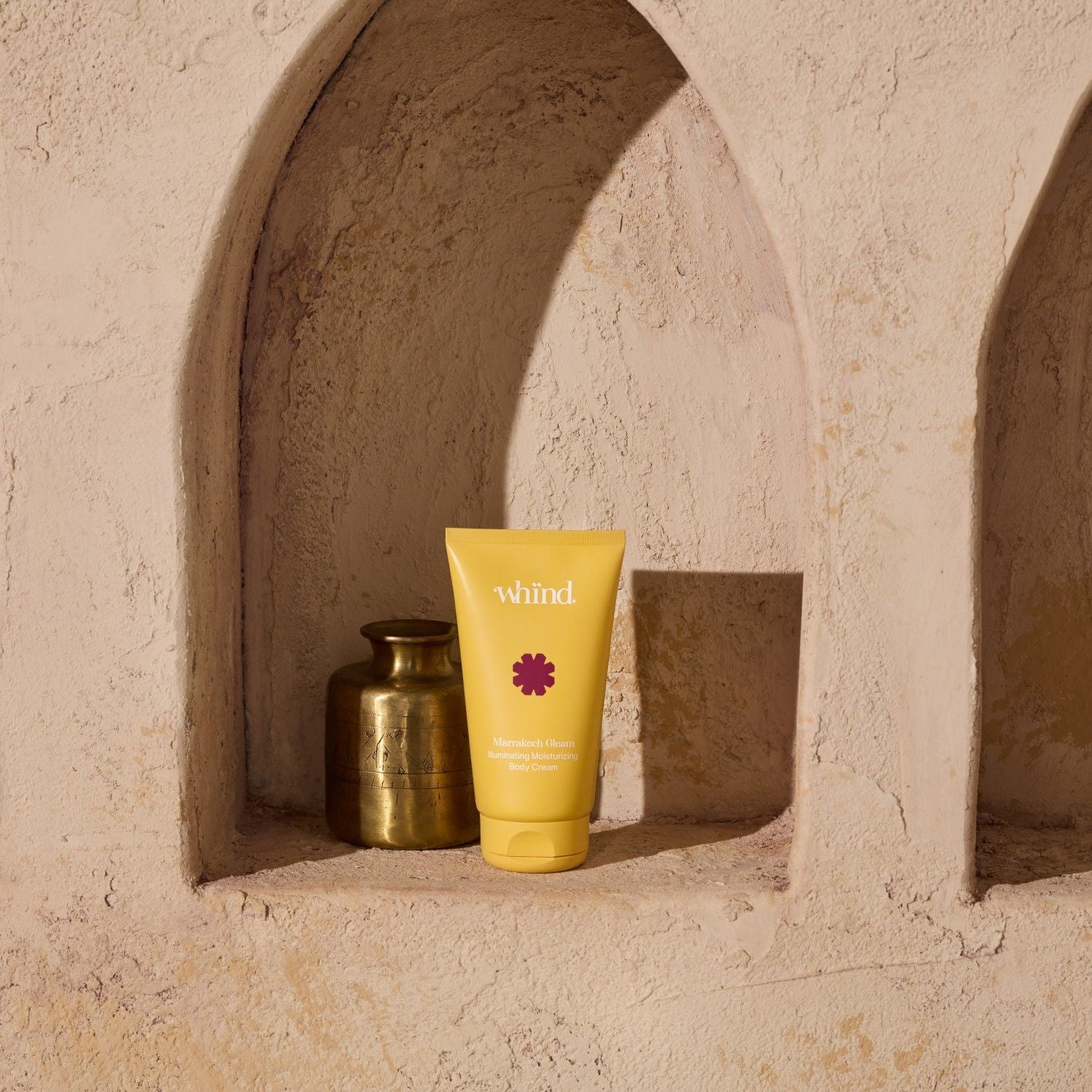 Lifestyle image of Whind Marrakech Gleam Illuminating Moisturizing Body Cream