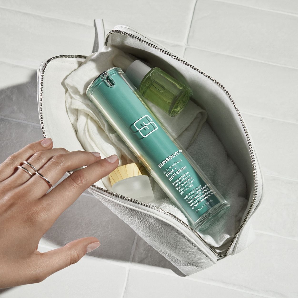 Lifestyle image of SunsolveMD ZnO+ Mineral Care Firm + Replenish SPF 50