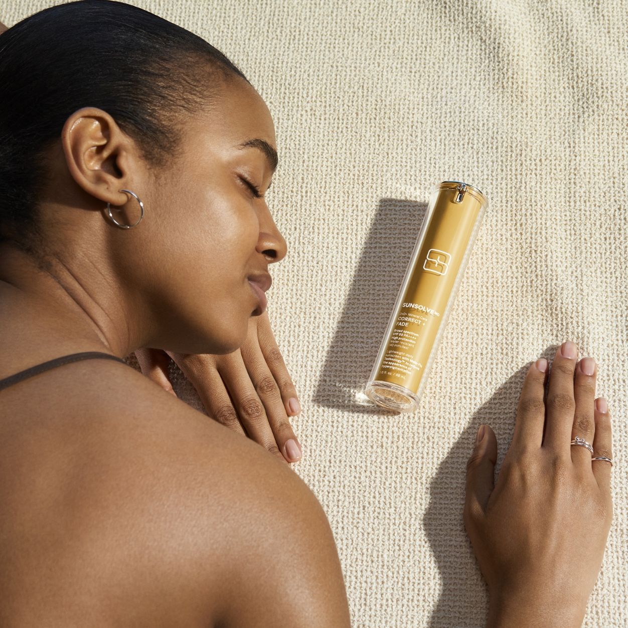 Model image of SunsolveMD ZnO+ Mineral Care Correct + Fade SPF 50