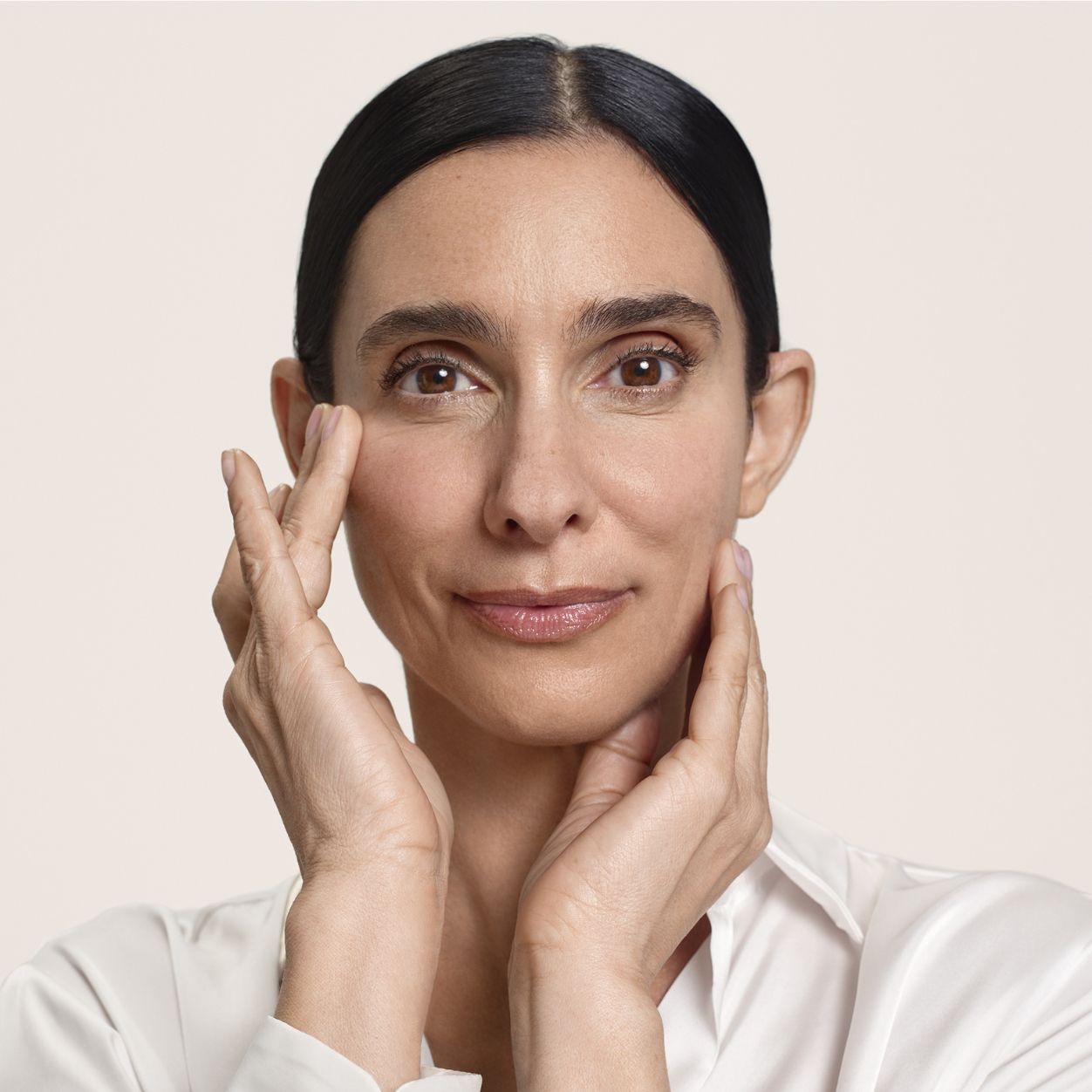 Model image of SunsolveMD LipidRestore Volumize + Restore SPF 40