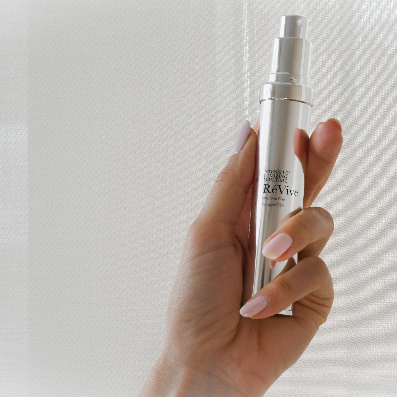 Lifestyle image of RéVive Intensité Volumizing Serum
