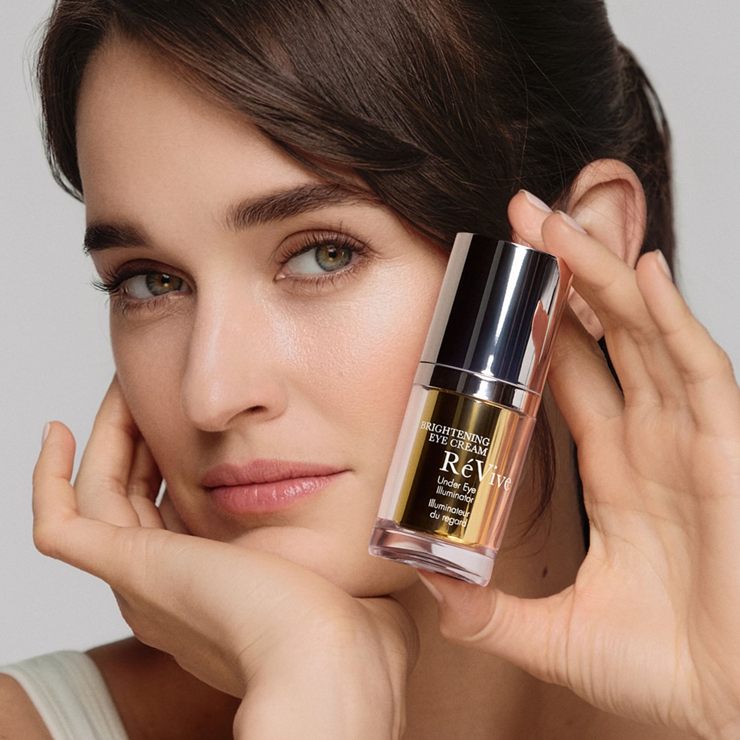 Model image of RéVive Brightening Eye Cream Under Eye Illuminator