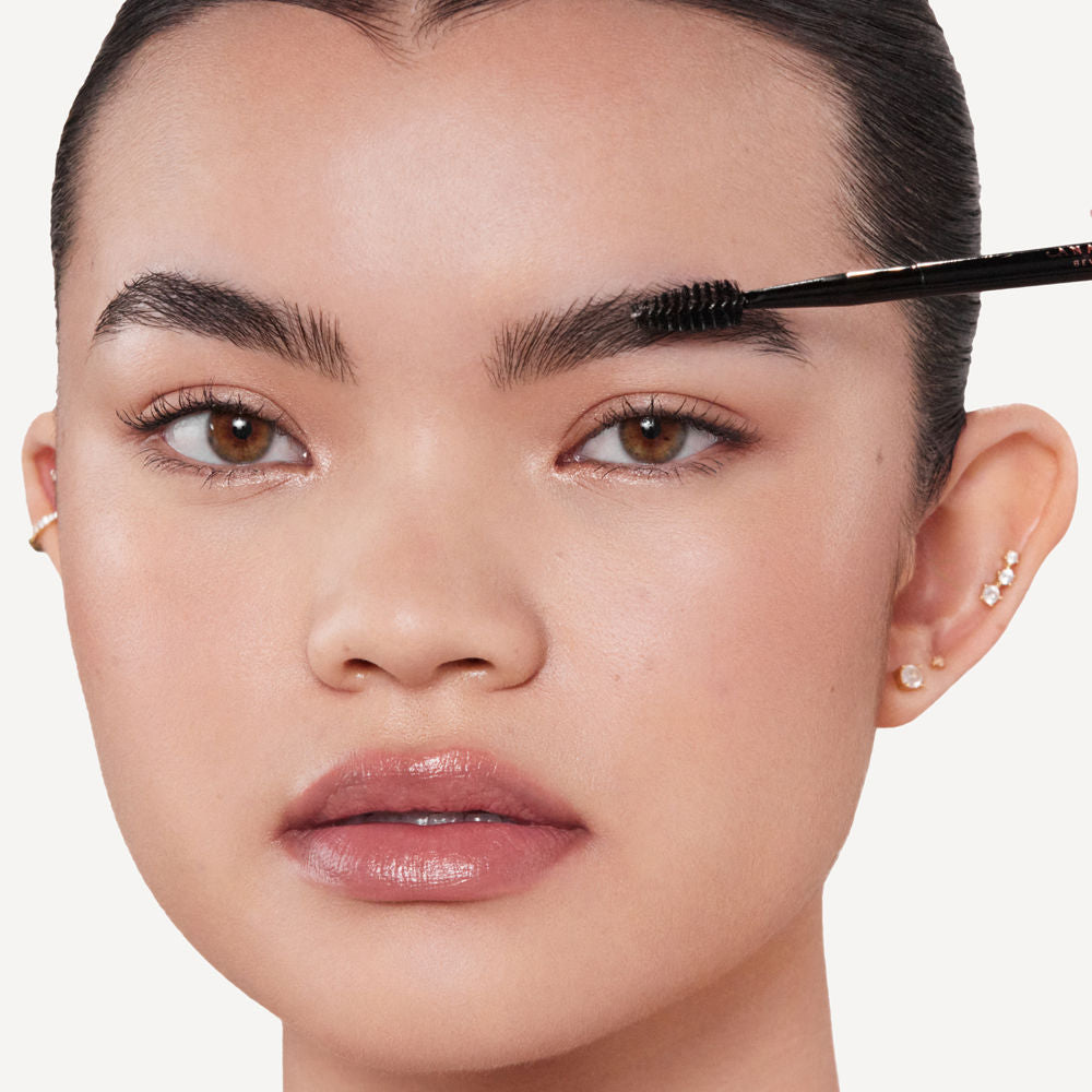 Model image of Anastasia Beverly Hills Brow Freeze Extreme Hold Laminated-Look Sculpting Eyebrow Wax
