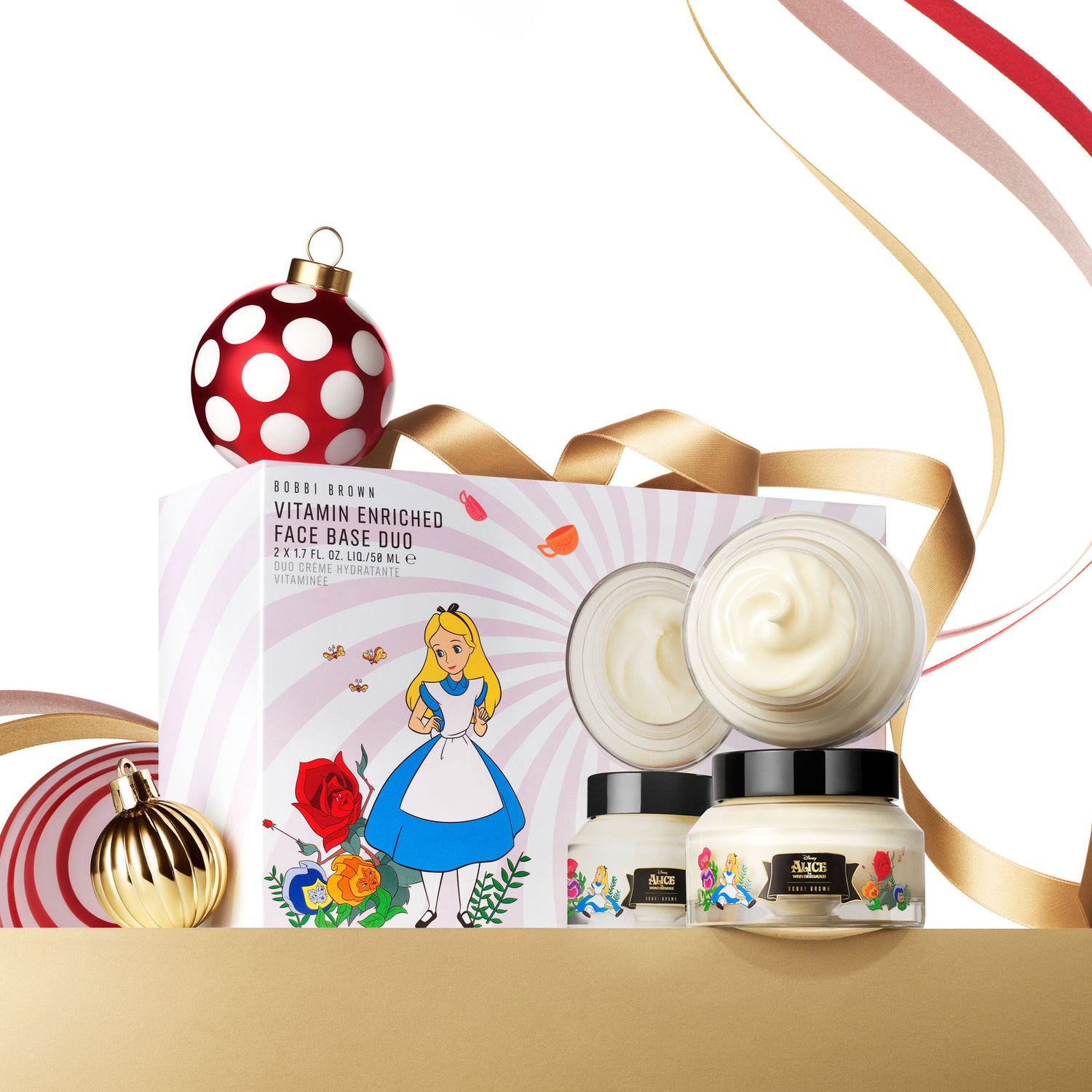 Lifestyle image of Bobbi Brown Alice in Wonderland Vitamin Enriched Face Base Duo Gift Set (Limited Edition)