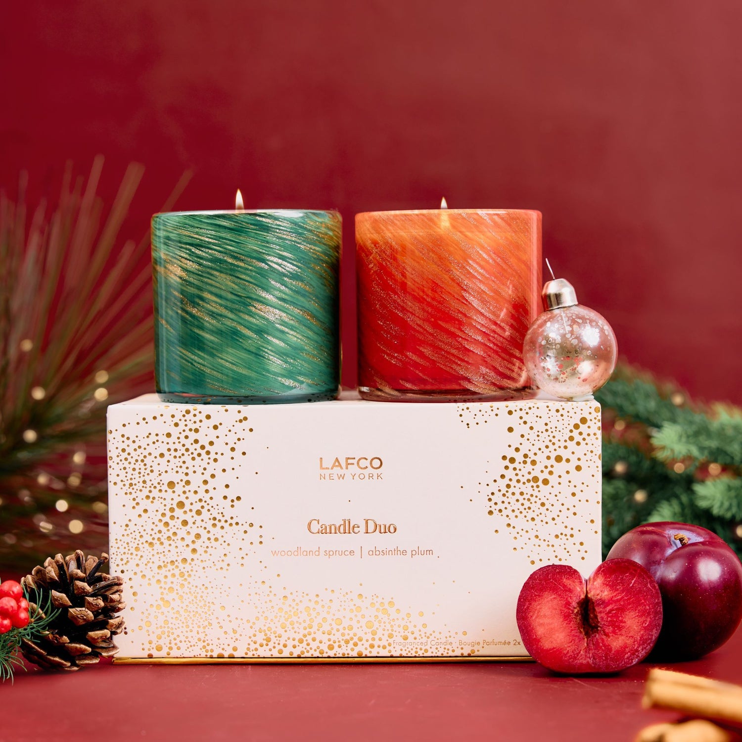 Lifestyle image of Lafco Absinthe Plum and Woodland Spruce Candle Duo (Limited Edition)