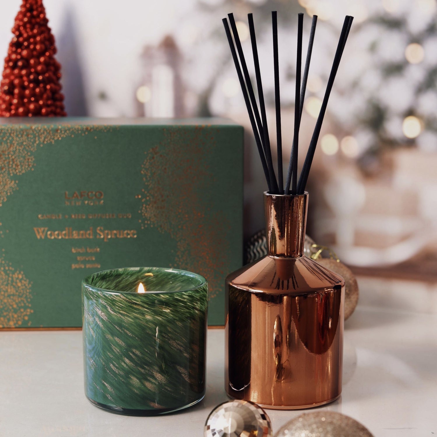 Lifestyle image of Lafco Woodland Spruce Candle and Reed Diffuser Duo (Limited Edition)