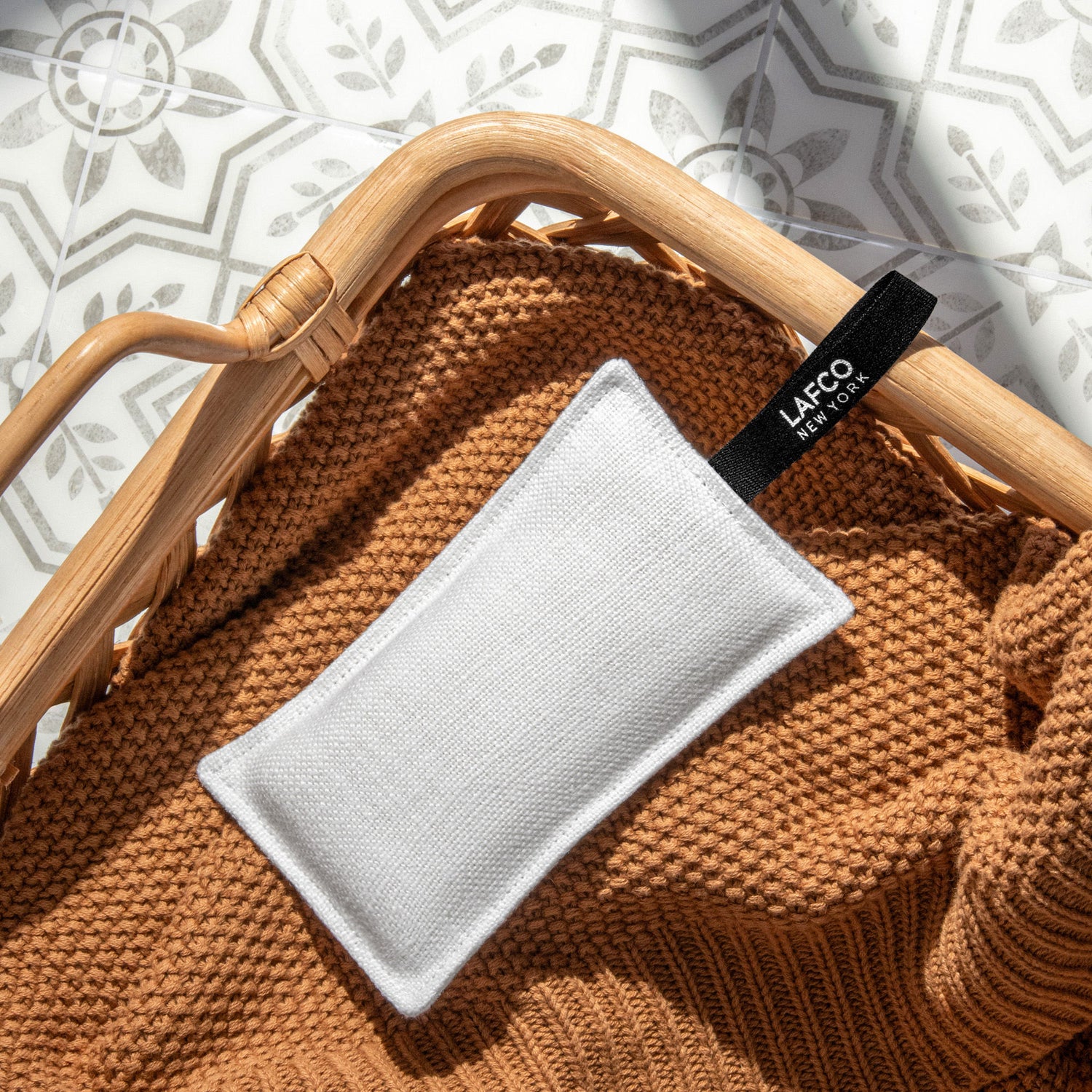 Lifestyle image of Lafco Sea & Dune Scented Linen Sachet