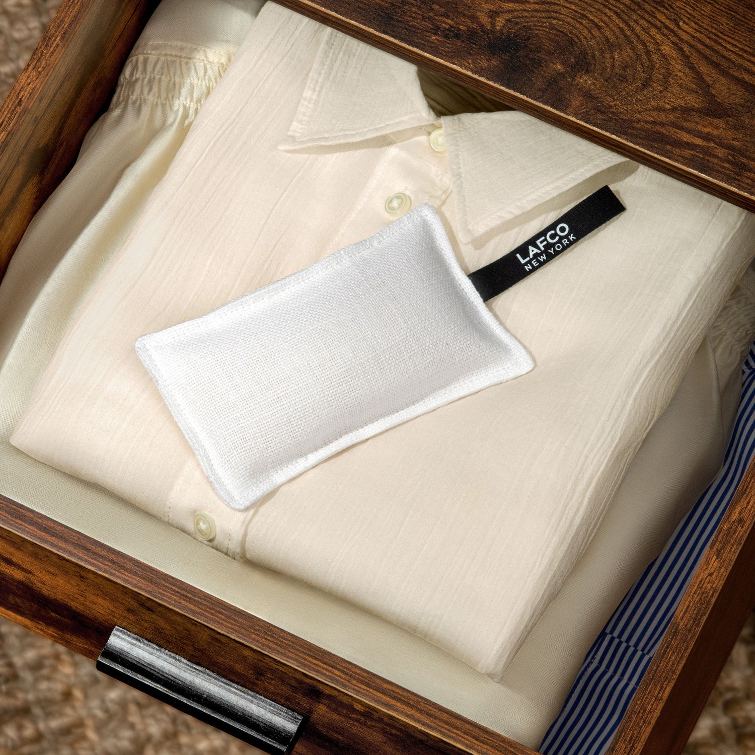 Lifestyle image of Lafco Feu de Bois Scented Linen Sachet