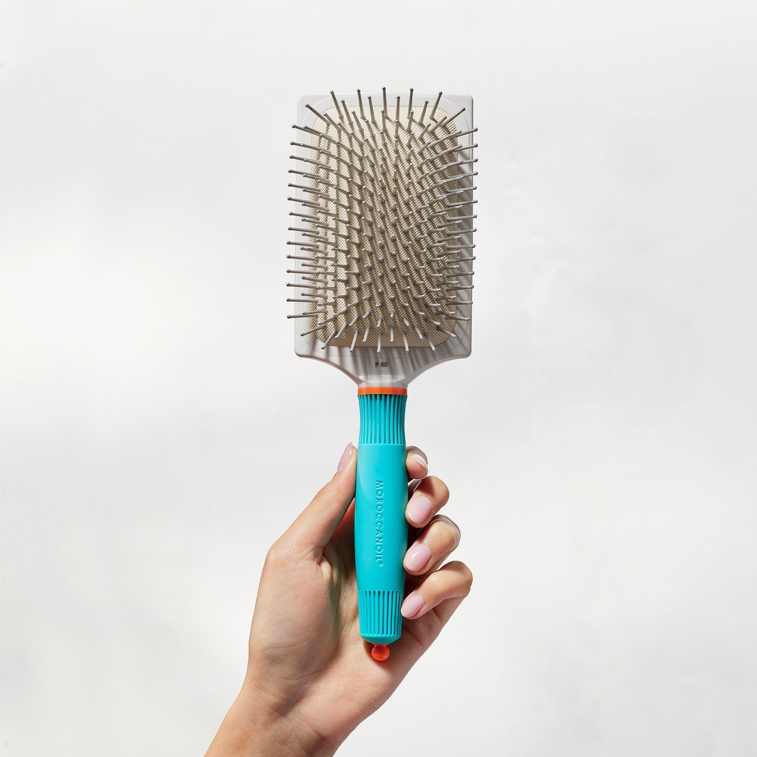 Lifestyle image of Moroccanoil Ceramic Paddle Brush