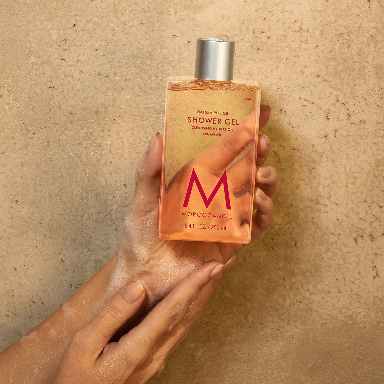Lifestyle image of Moroccanoil Dahlia Rouge Shower Gel