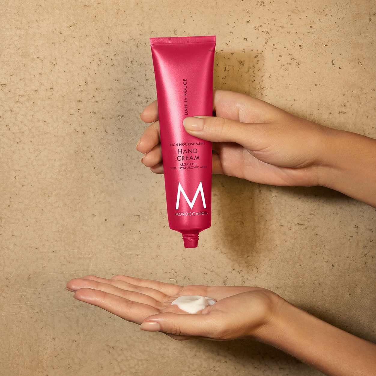 Lifestyle image of Moroccanoil Dahlia Rouge Hand Cream