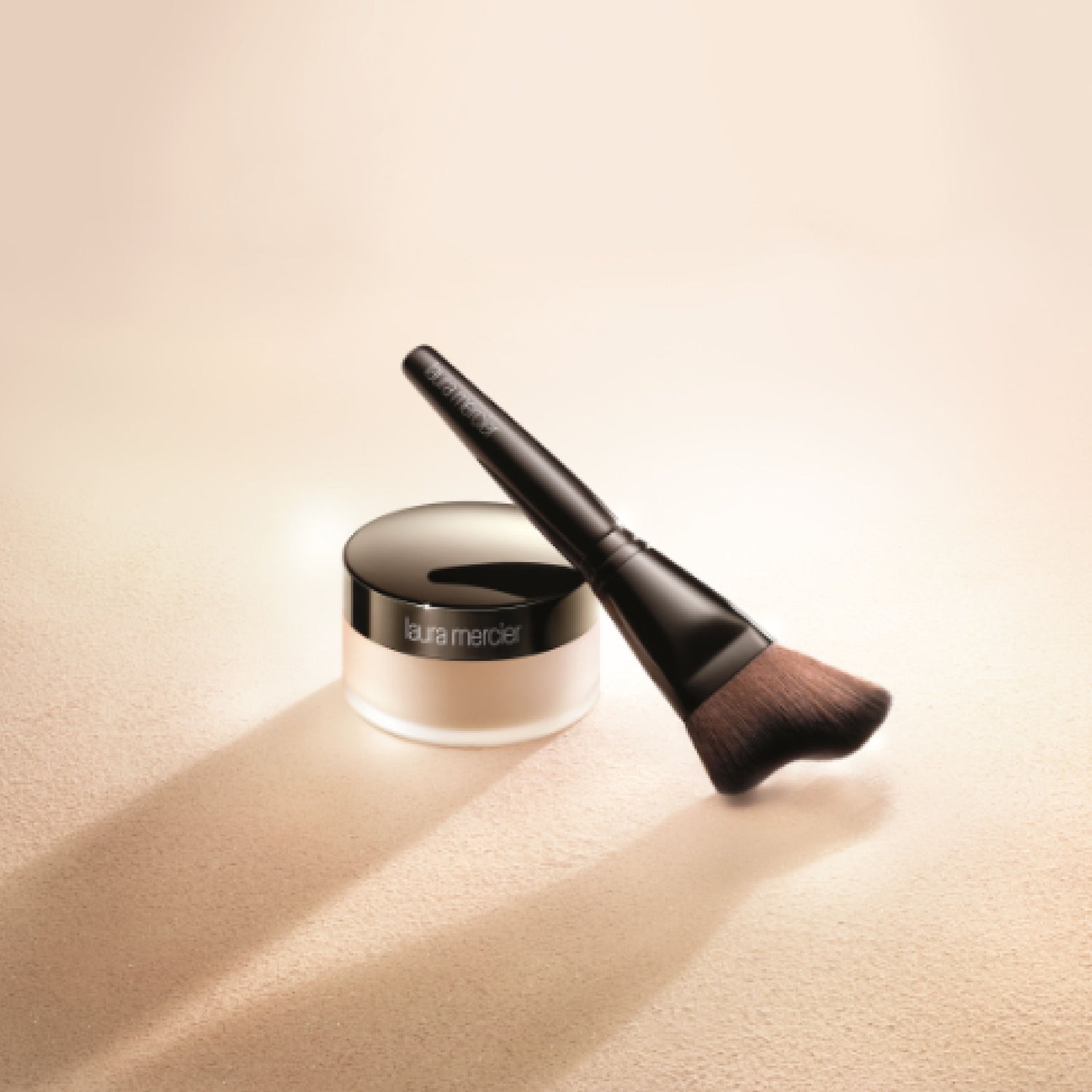 Lifestyle image of Laura Mercier Translucent Loose Setting Powder Glow Brush