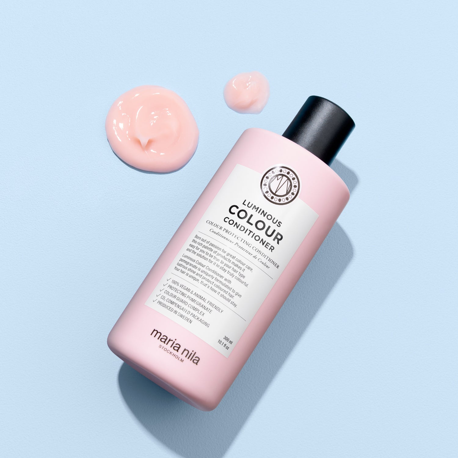 Image of an open Maria Nila Luminous Colour Conditioner