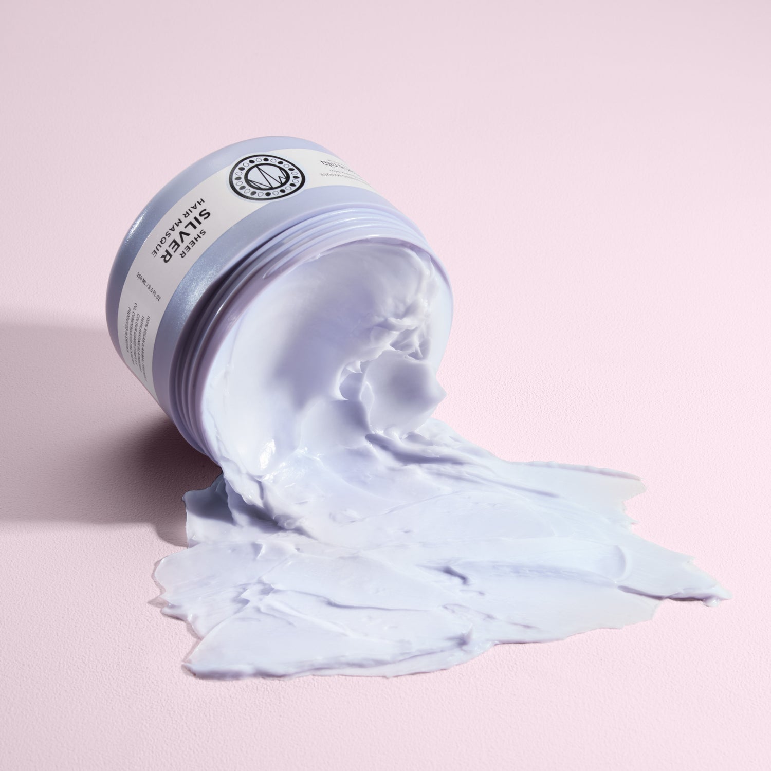 Image of an open Maria Nila Sheer Silver Masque
