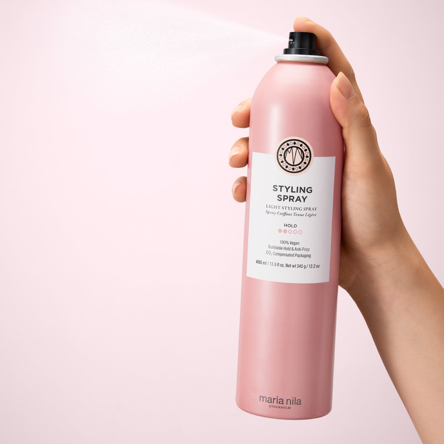 Image of an open Maria Nila Styling Spray