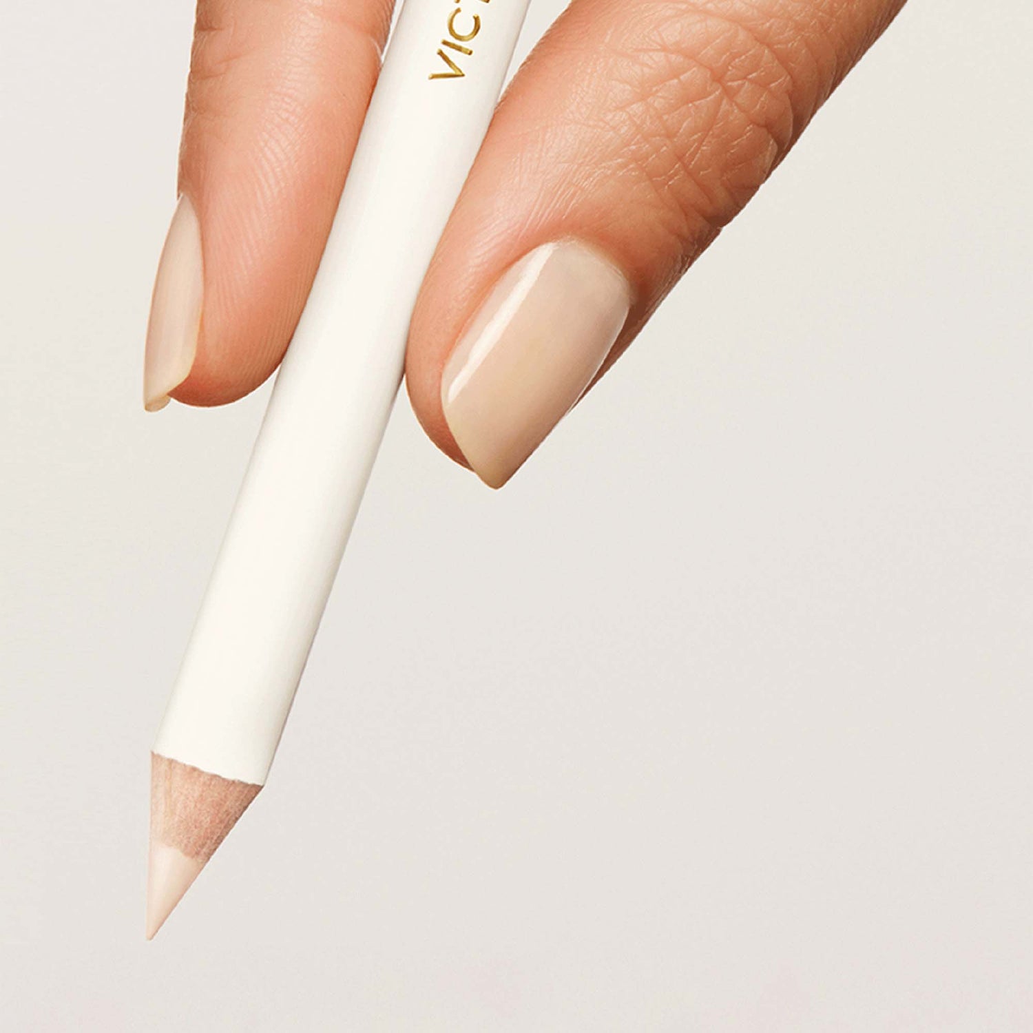 Lifestyle image of Victoria Beckham Beauty Instant Brightening Waterline Pencil