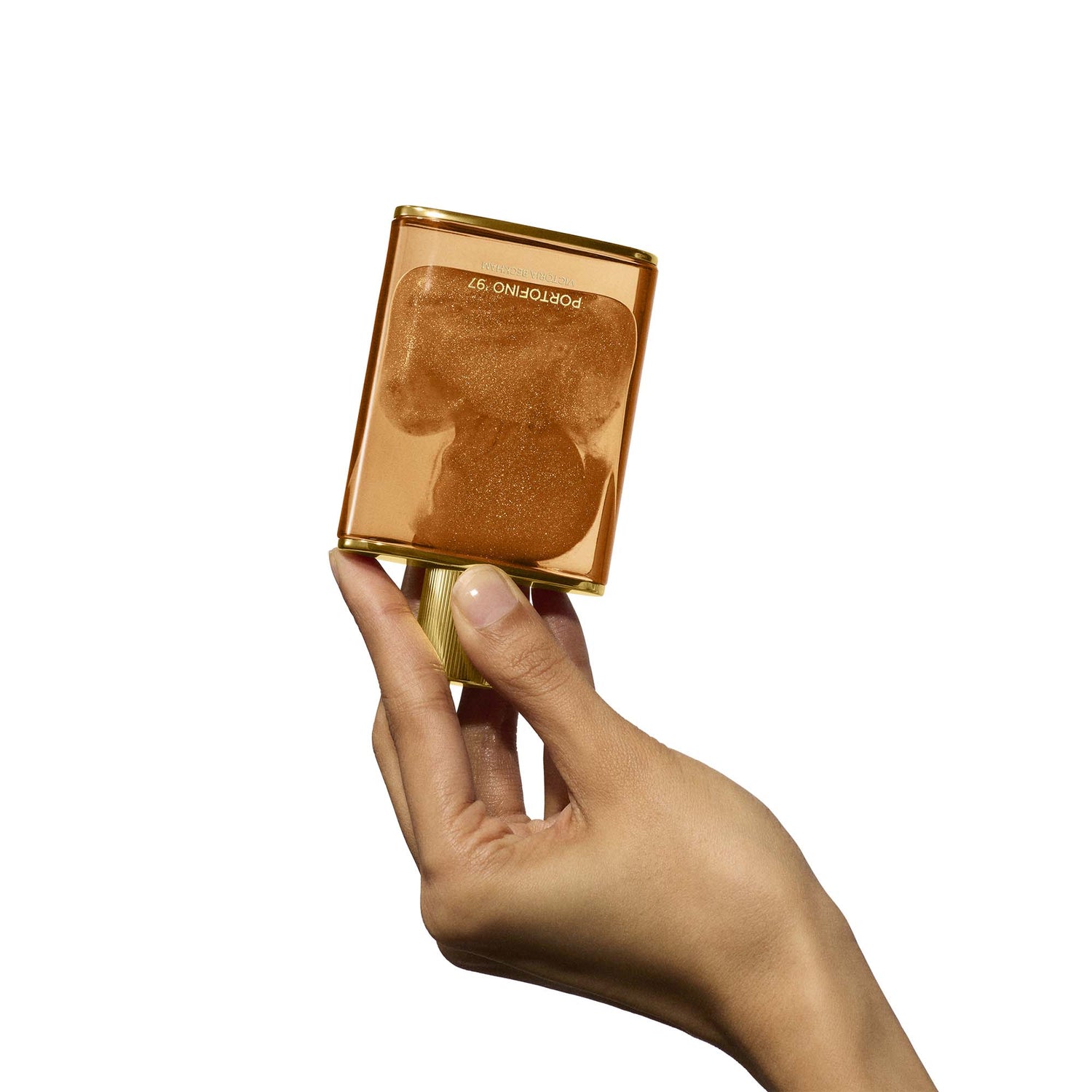 Lifestyle image of Victoria Beckham Beauty Portofino '97 Golden Shimmer Body Oil