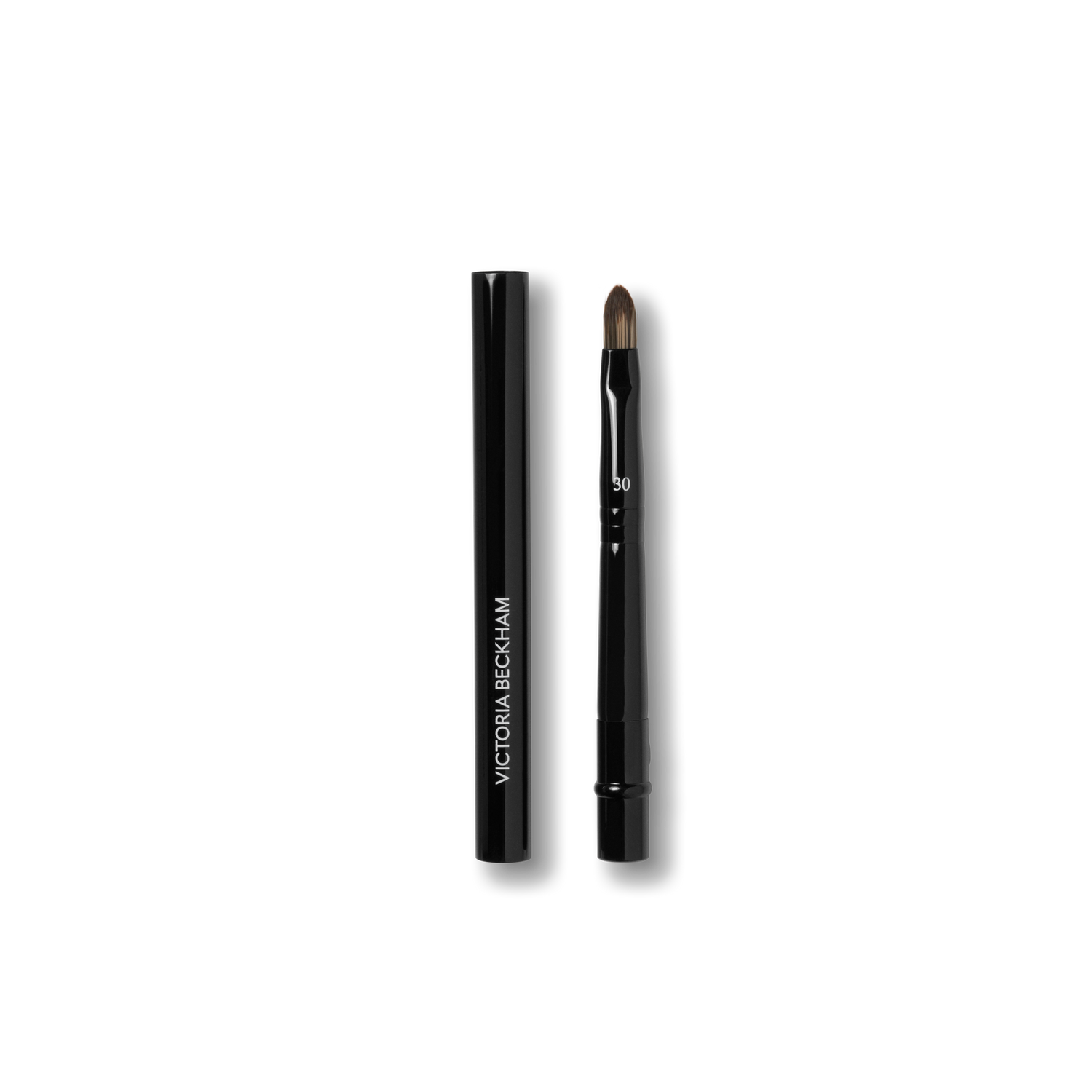 Image of an open Victoria Beckham Beauty Detailed Lip Brush