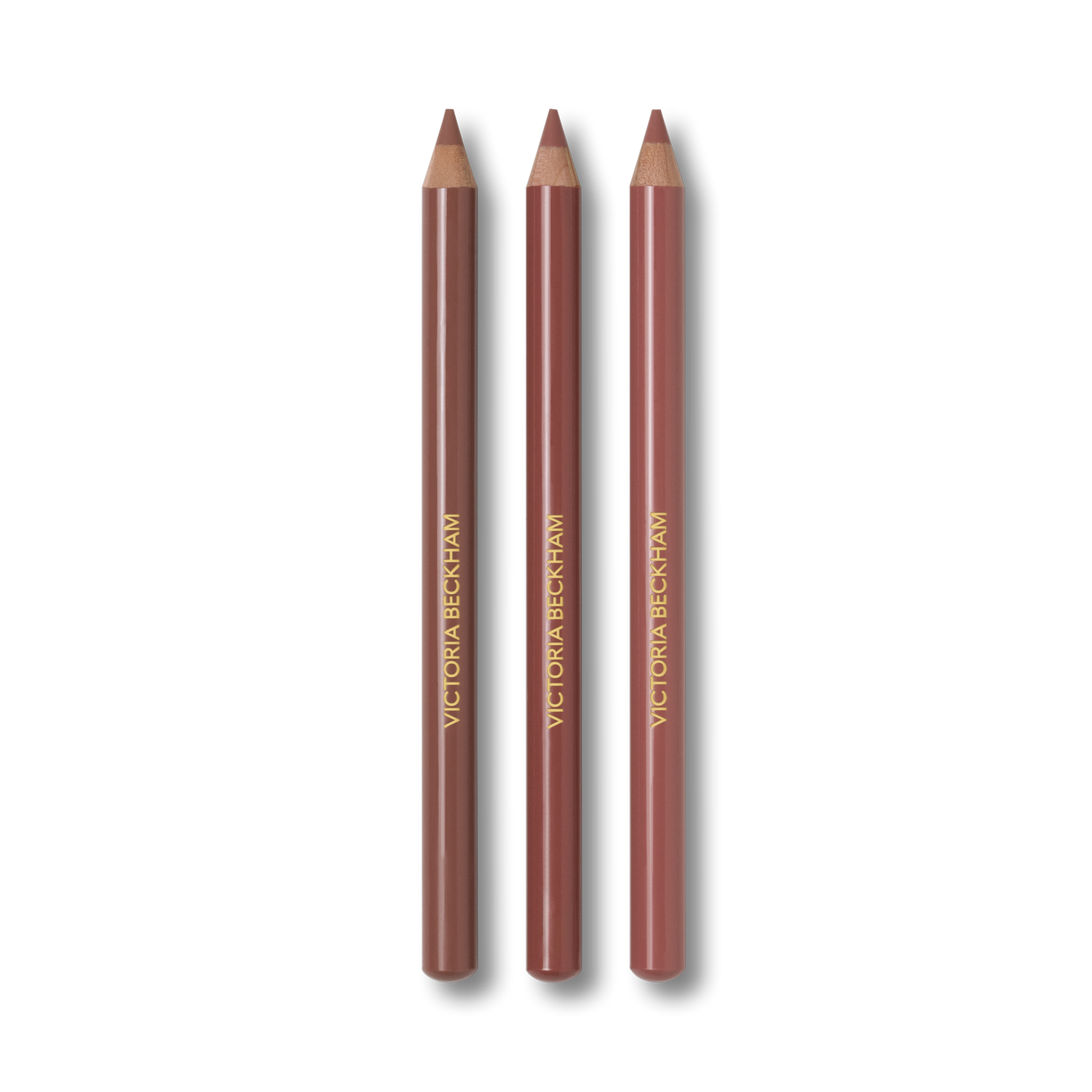 Image of an open Victoria Beckham Beauty Lip Definer Trio: The Private Collection