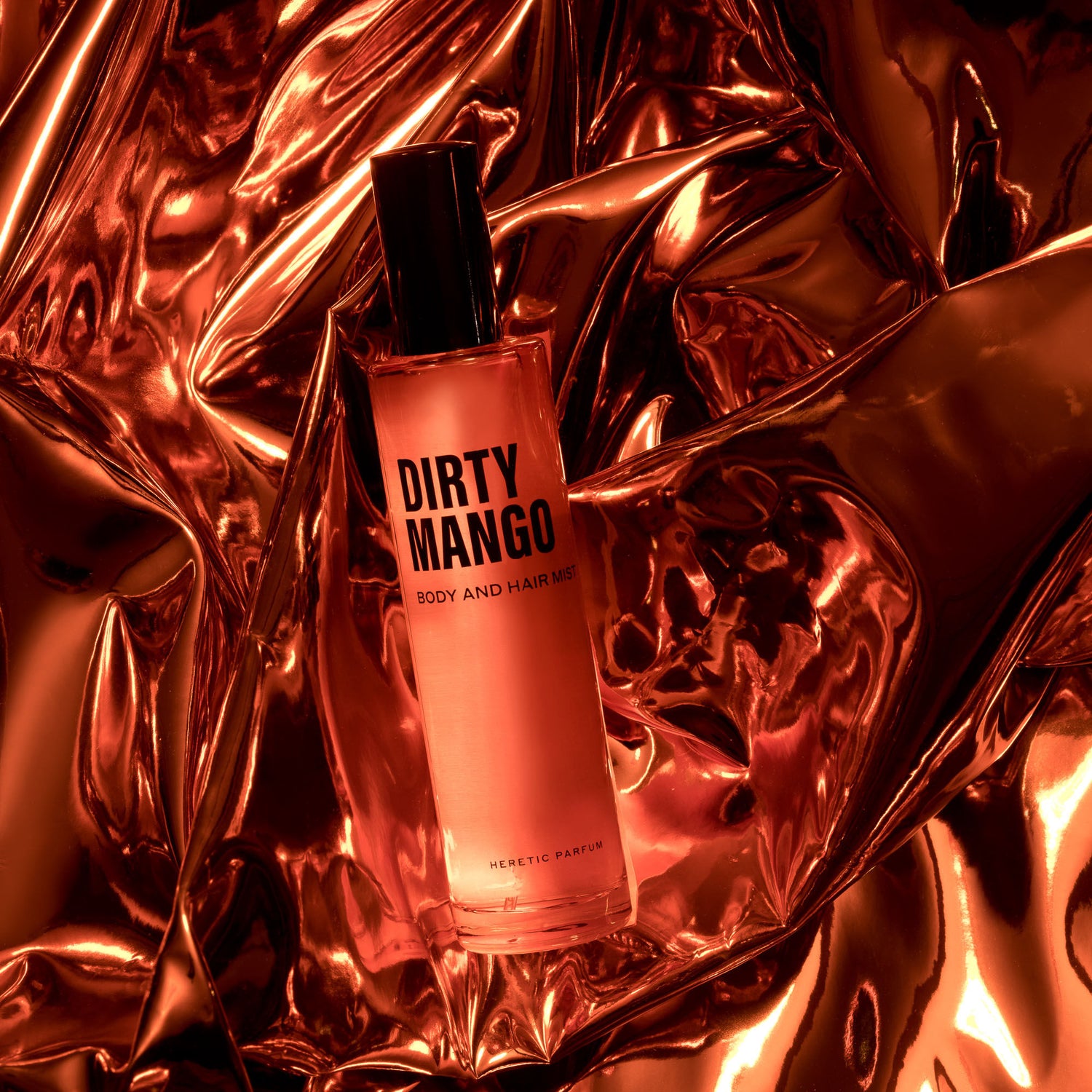 Swatch image of Heretic Dirty Mango Body and Hair Mist