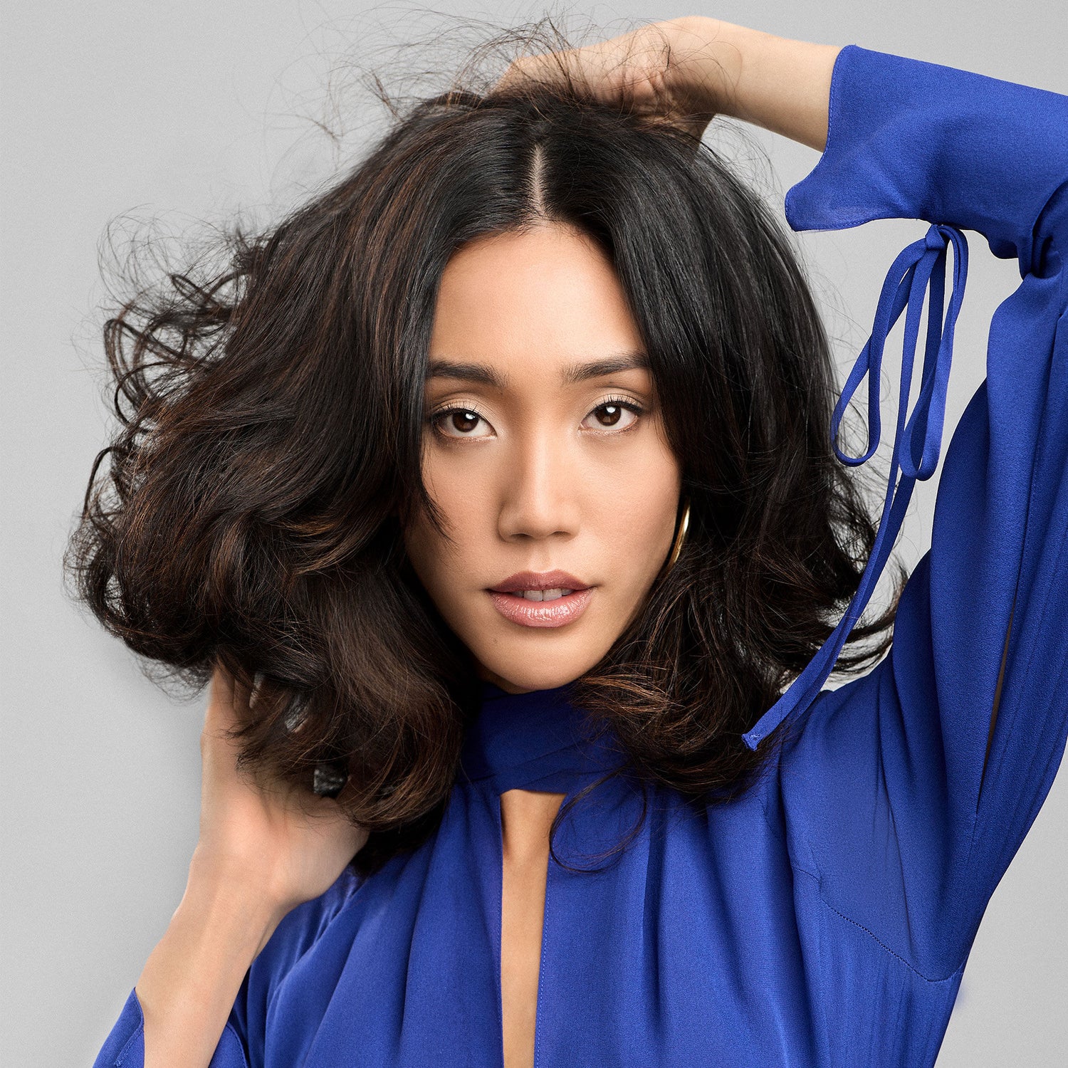 Model image of R+Co Bleu F-Layer Deep Conditioning Serum