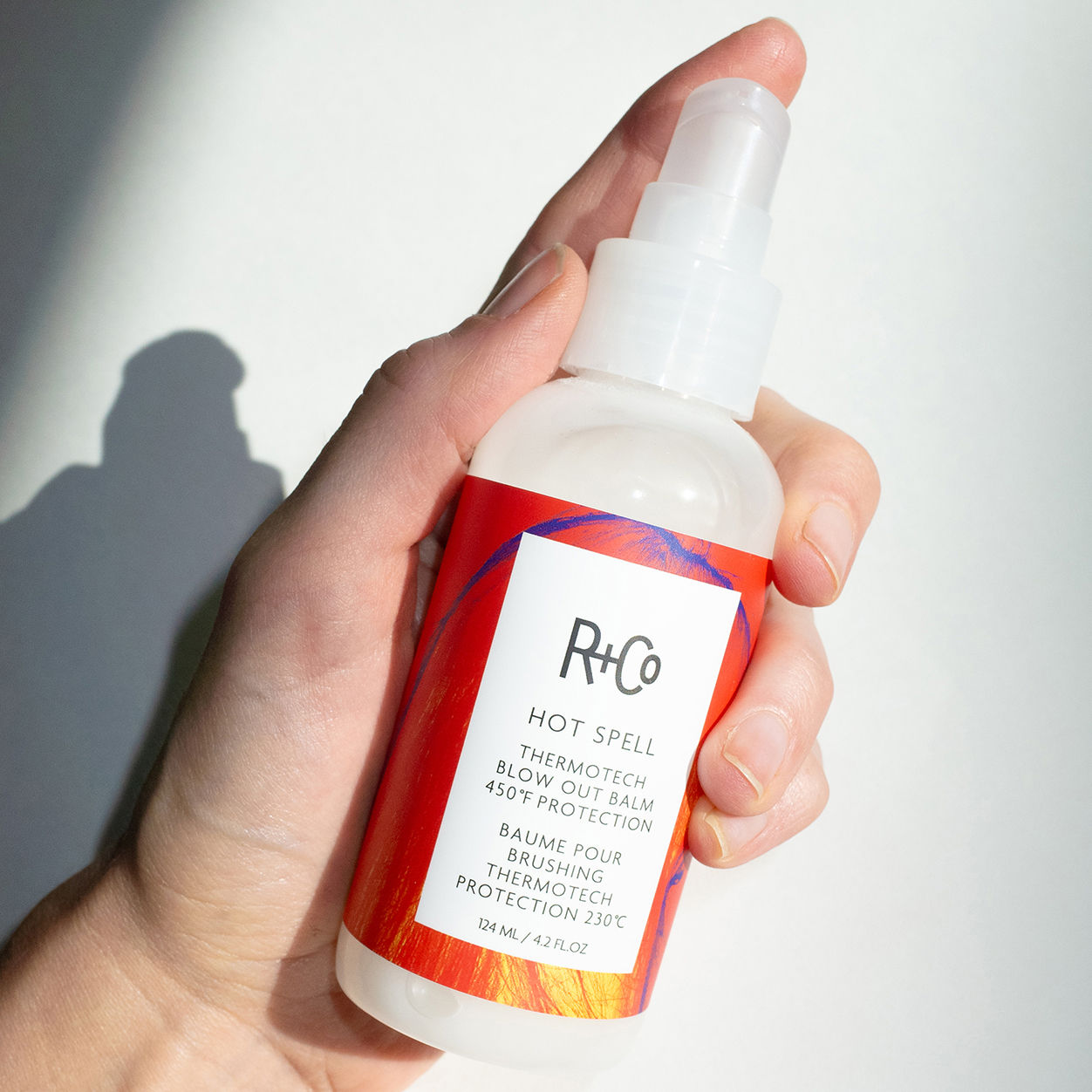 Lifestyle image of R+Co Hot Spell Thermotech Blow Out Balm
